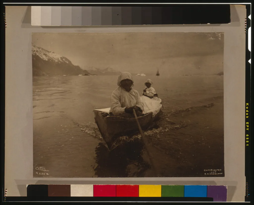 Seal hunters in canoe at Glacier Bay, Glacier Bay, Alaska, 1899