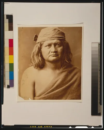 [Native man, head-and-shoulders portrait, facing front], 1903
