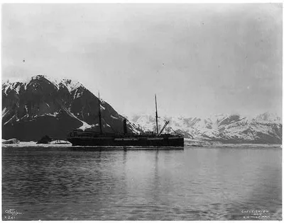 [Ship, GEORGE W. ELDER, in ice on bay with mountains behind, Alaska…, 1899