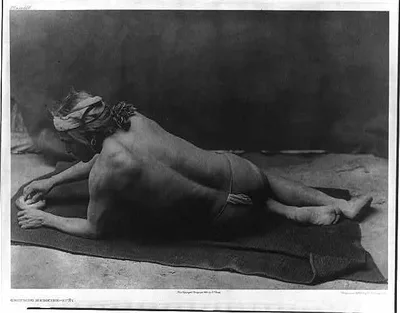 Photograph from 1925: Grinding medicine--Zuni