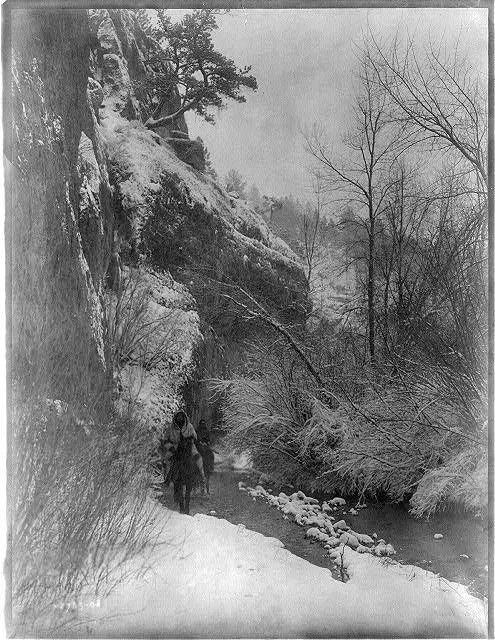 Passing the cliff--Apsaroke, Pryor Mountains, Wyoming, Montana, 1908