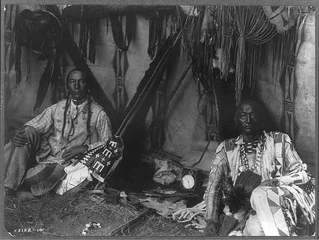 In a Piegan lodge, 1910