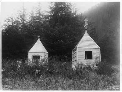 [Russian cemetery, Alaska. Wooden tombs], 1899