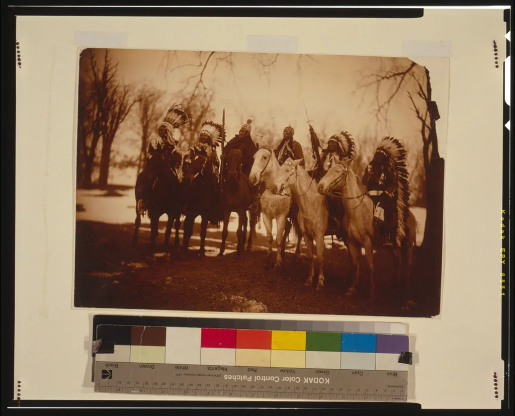 [Six tribal leaders (l to r) Little Plume (Piegan), Buckskin Charley…, 1900