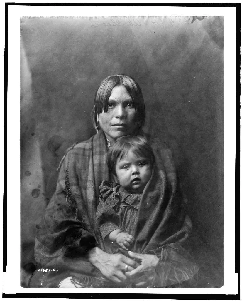 Babe and parent, 1905