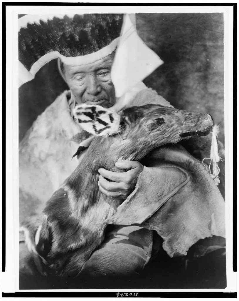 [Dancer with black deer effigy--Hupa], California, 1923