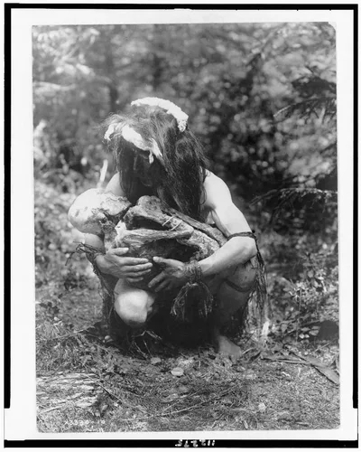 Photograph from 1911: Preparing to eat the mummy