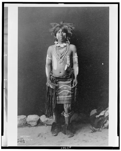 Snake dancer in costume, 1900