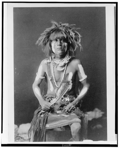 Honovi-Walpi snake priest, with Totkya Day painting, 1910